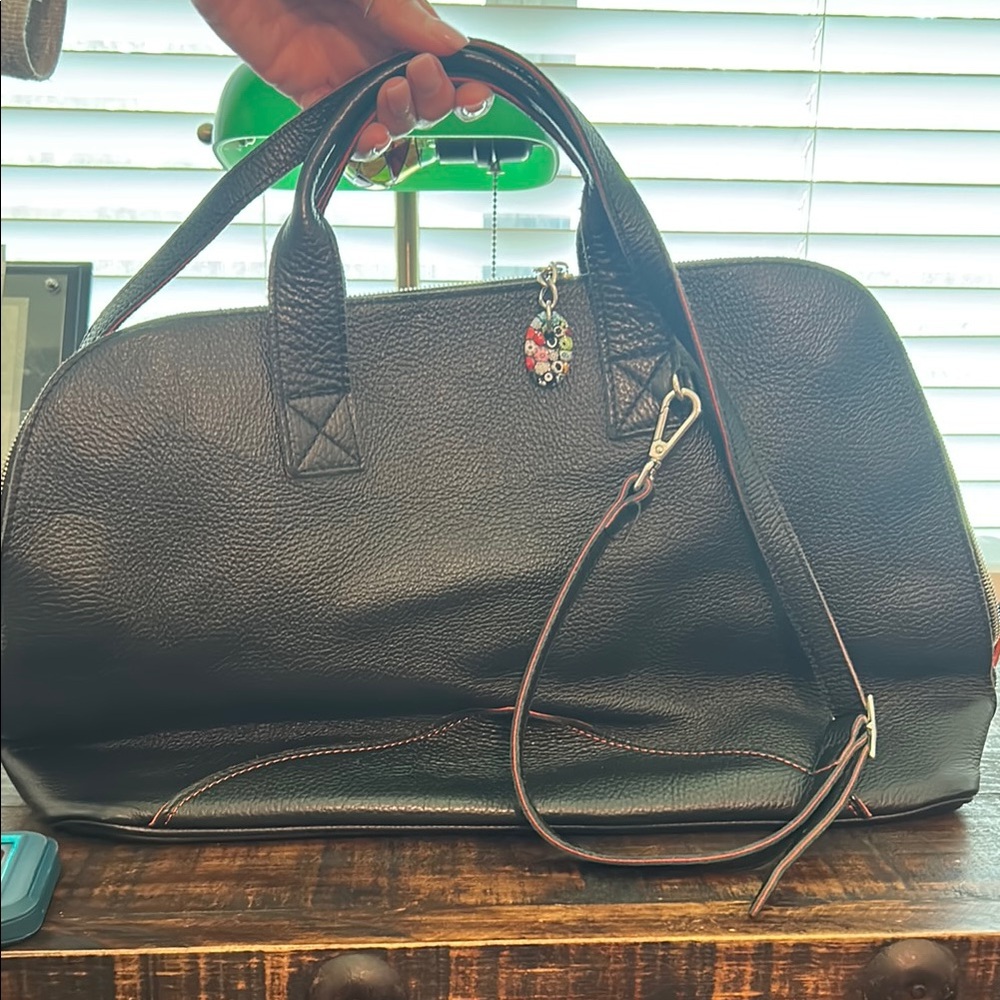 Black Duffel Bag with Structured Design and Detachable Strap